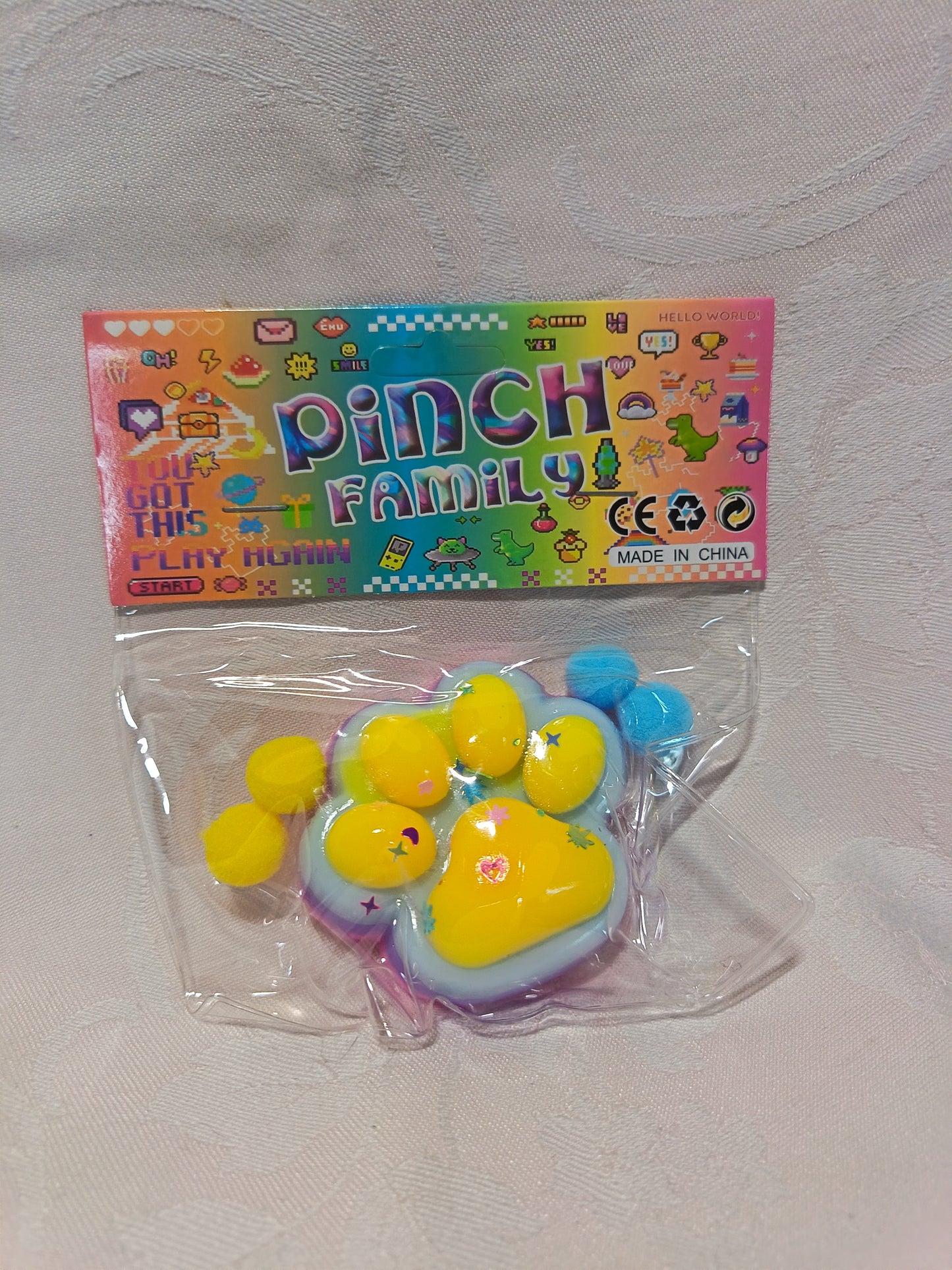 Pinch Family Quetsch-Pfote – Squishy Fidget mit Mini-Bällchen | NEU
