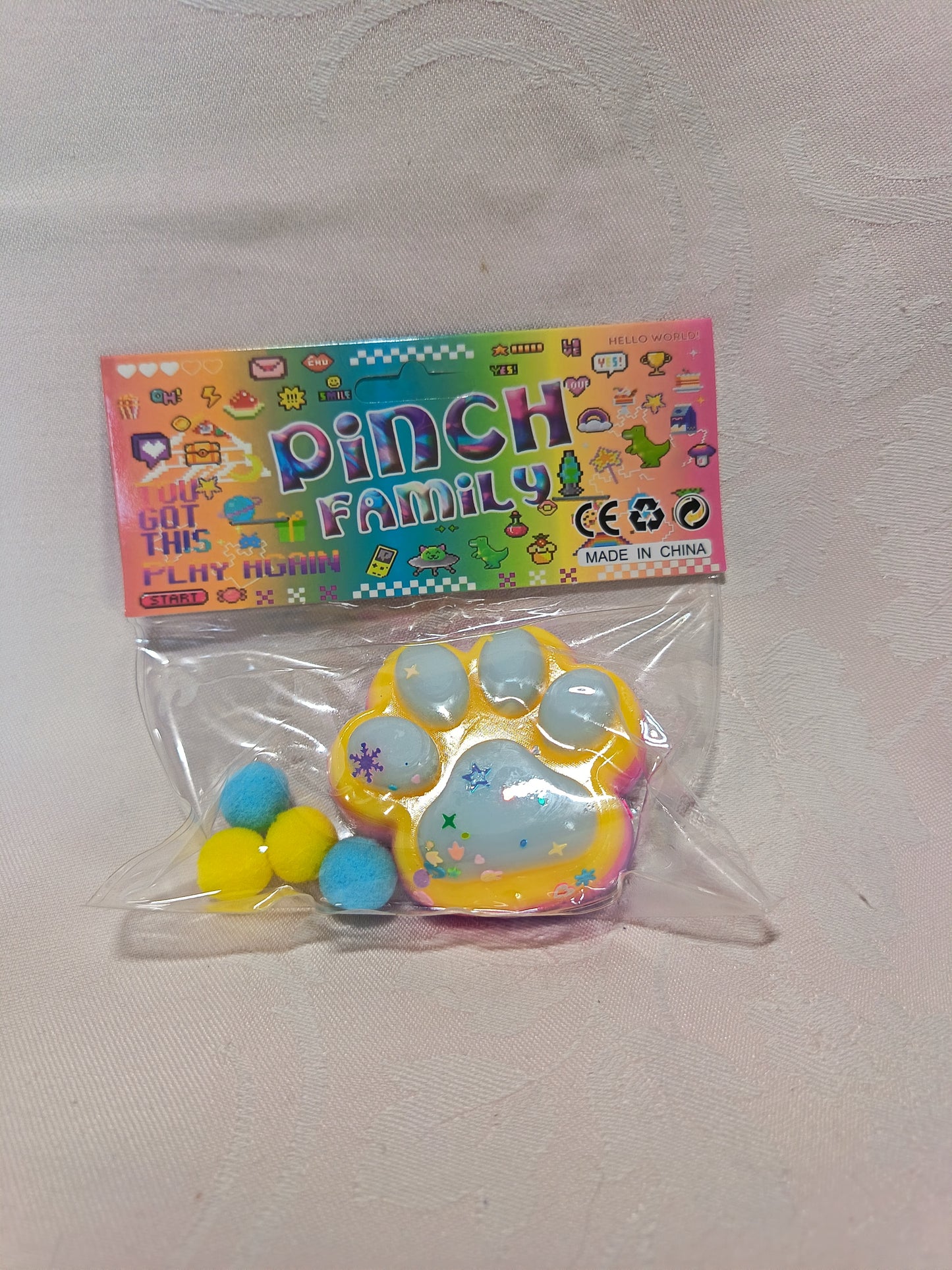 Pinch Family Quetsch-Pfote – Squishy Fidget mit Mini-Bällchen | NEU